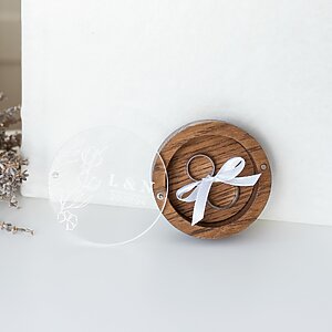 Dark stylish wooden wedding ring box with glass lid, featuring a sophisticated design for elegant ring presentation