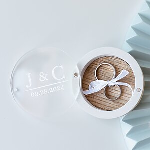 White engagement gypsum ring box with natural oak insert, magnetic glass lid, and ribbon for securing rings