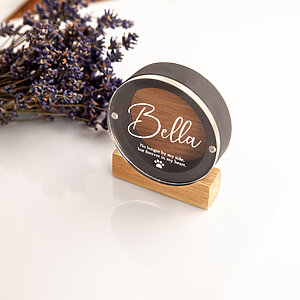 Custom engraved round dog fur keepsake box for Bella with oak stand